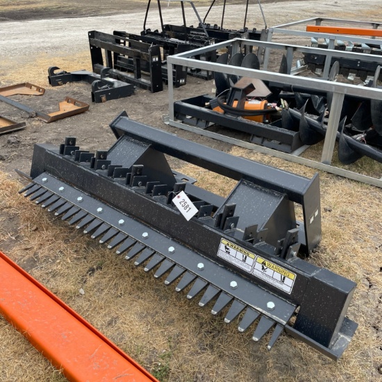 New Wolverine skid steer ripper rake