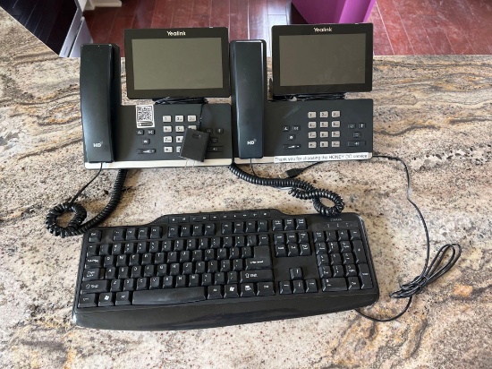 Lot of Yealink Office Phones and Computer Keyboard