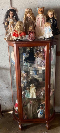 Curio Cabinet with Porcelain Unmarked Dolls.