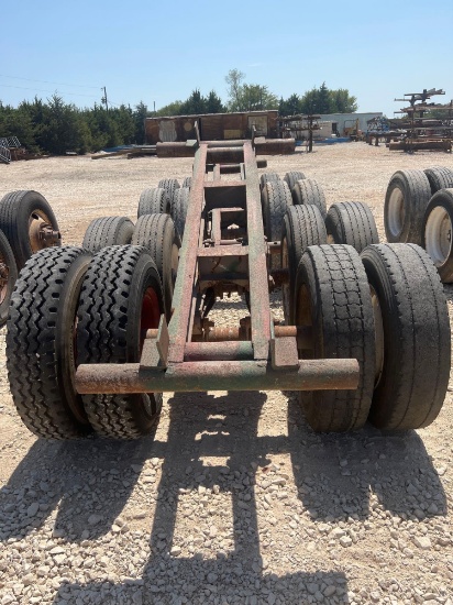 A set of two tandem axle house moving dollies. Tire size. 11 R 22.5.