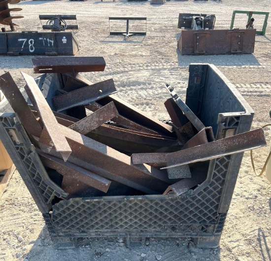 Crate of Metal Jigs to Jack House Up off Concrete Slab