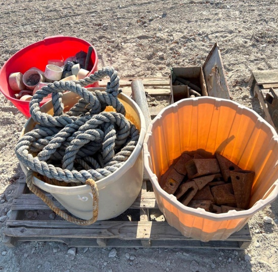 Pallet of Misc. Rope, PVC Parts, Backhoe, and Dozer Teeth