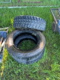 Stack of 3 Tires - 1 is 285 70/R 17 - 2 are 225-7019.5