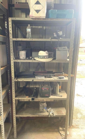 Shelf with Contents: Misc. Batteries, 2...Bolt Cutters, Hitch...Pins, Bottle...Jacks, Battery Jum...