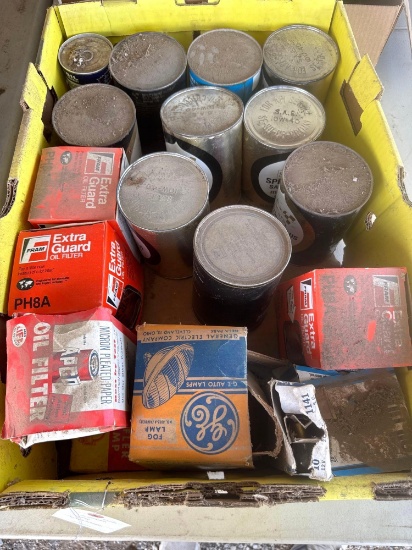 Box of Misc. Motor Oil, Transmission Fluid, Light Bulbs, Filters, etc.