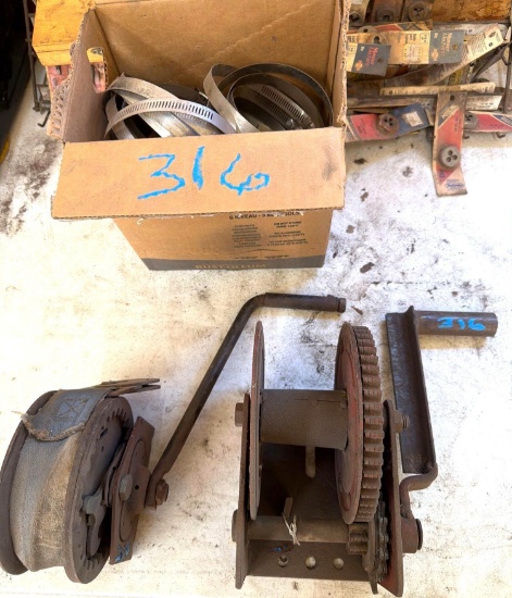 Lot of (2) Hand Crank Winches & Assorted Large Hose Clamps