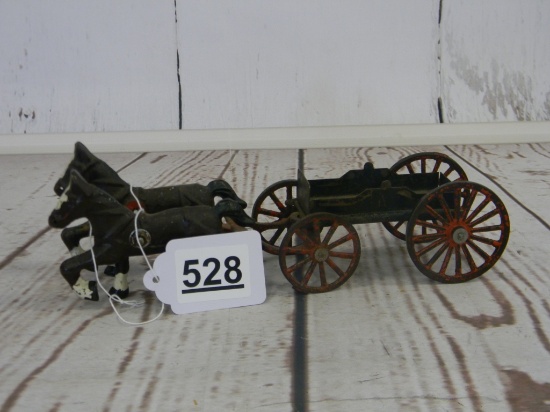 CAST IRON BUCKBOARD W/ TEAM