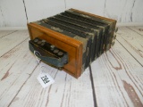 SMALL WOODEN ACCORDIAN