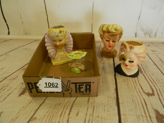 FLAT OF 4 HEAD VASES