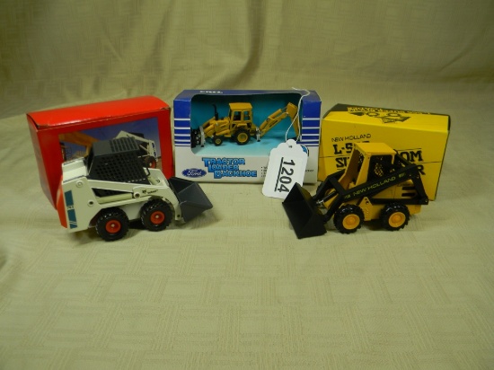NH L-555 SKID STEER, BOBCAT 743 SKID STEER