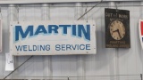 MARTIN WELDING AND OUT TO WORK SIGNS