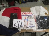 Assortment Of Cloth Items And Two Aprons