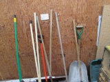 Pile Of Brooms Shovels Etc
