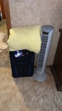 Fan and suitcase and old quilt
