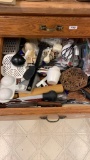 Contents of drawer kitchen stuff