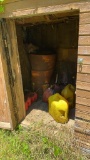 Contents of small shed. Gas cans