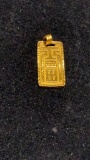 24 ct gold charm Weights 7 grams