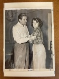 Unidentified Photo of Errol Flynn with Republic Blue Ticket Attached and Wide World Photos Stamp