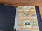 Binder with 60 Collectible Pokemon Cards Common to Rare Hitmonchan Vaporeon Lapras Poliwrath Kangask