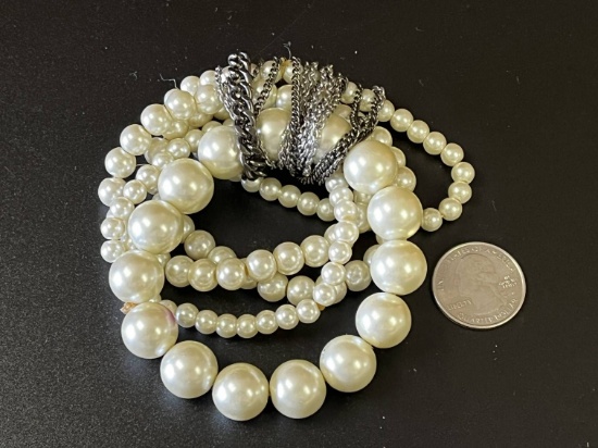 Multiple Size Cultured Pearl Braceletts Bound Together with Black & Silver Chains