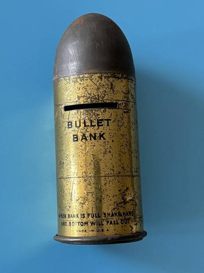Antique Bullet Shaped Coin Bank