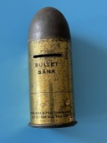 Antique Bullet Shaped Coin Bank