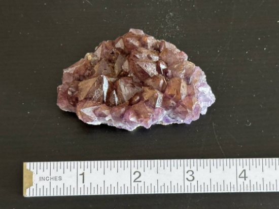 3 1/4" Long Piece of Amethyst Crystals. Small plate.