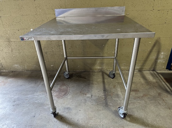 36" x 36" x 38.5"H All Stainless Steel Work Table w/4" Rear Backsplash on Casters
