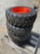 Qty (4) Unused 10-16.5 Skid Steer Tires and Rims
