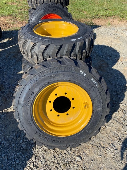 Set of 4 new 10-16.5 Forerunner Skid Steer tires on NH/JD/CAT rims