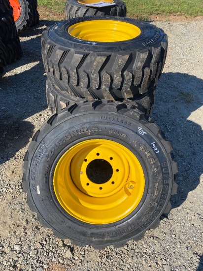 set of 4 new 12-16.5 Forerunner Skid Steer tires on NH/JD/CAT rims