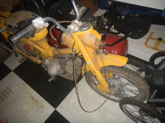 Yellow Honda Mini-Trail Motorcycle