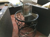 Round Wrought Iron, Bird Pattern Side Table w/Glass Top and a Williamsburg Style 1768 Candle Lantern