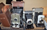 Lot of old folding cameras