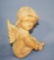 Old carved wooden cupid