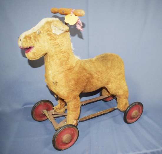 Old straw stuffed riding horse