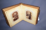 Old photo album with photographs