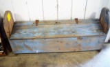 Old blue painted bench with interior storage