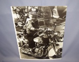 Vintage hard print of child on Indian motorcycle ride