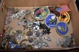 Box full of pins, button backs & patches