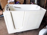 SMALL WHIRLPOOL WALK IN TUB WITH JETS - NEEDS DRAIN - PICK UP ONLY