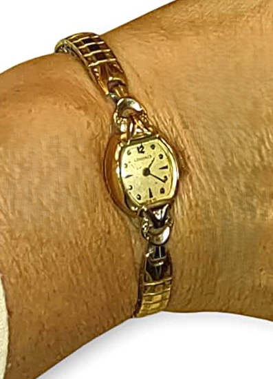 VINTAGE LADIES LONGINES WRIST WATCH - 14K GOLD CASE - KEEPS GOOD TIME