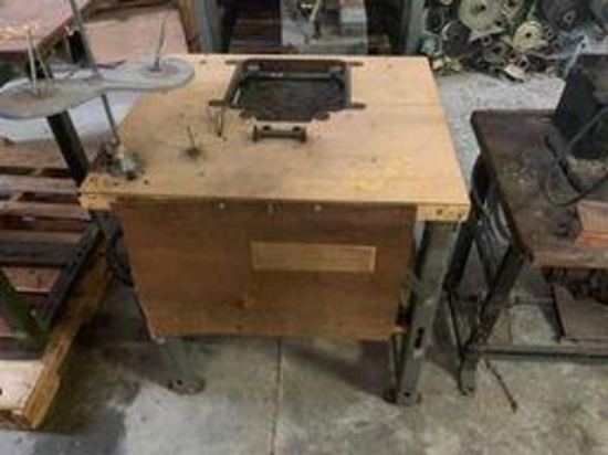 Sewing table with thread tree