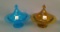 Pair of Co-Op Flint Ftd. Covered Compotes Blue and Amber with Fleur de lis Finials