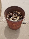 bucket of horseshoes