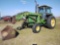 John Deere 4450 with 158 loader, hay spikes, and bucket