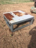...1 inch flat steel top with square tubing legs... ...58