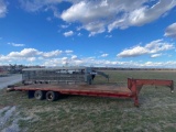 30 ? FLAT...BED TRAILER WITH A 4 ? DOVE TAIL AND RAMPS 2 10 K AXLES WITH A METAL DECK SELLS WITH A