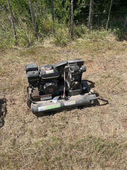 Gas Powered air compressor with a Honda motor. New Condition...