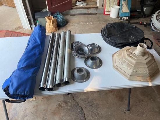 LAWN CHAIR, TABLE LEGS, TABLE LEG HOLDERS, UMBRELLA BASE,... AND COLLAPSABLE TRAS CAN...